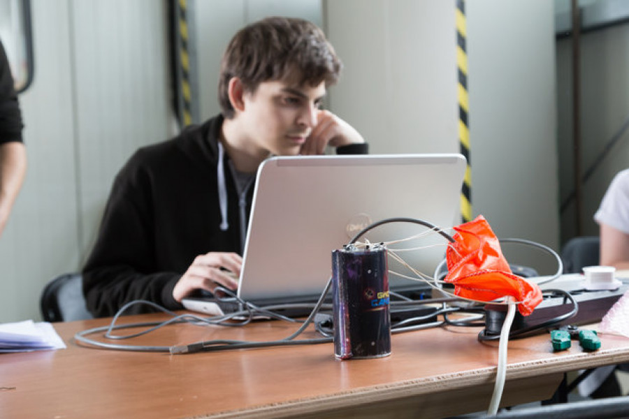 Student getting his CanSat ready for launch at the 2017 European CanSat Competition large